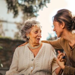 woman caring for elderly